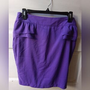 Purple Peplum Lined Skirt NWT. Sz Medium. 96% poly, 4% spandex.